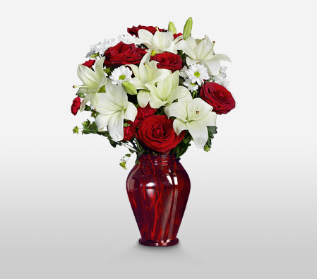Festive Felicity <Br><span>Complimentary Ruby Ginger Vase </span>