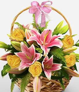 Roses And Lilies Arrangement In A Basket